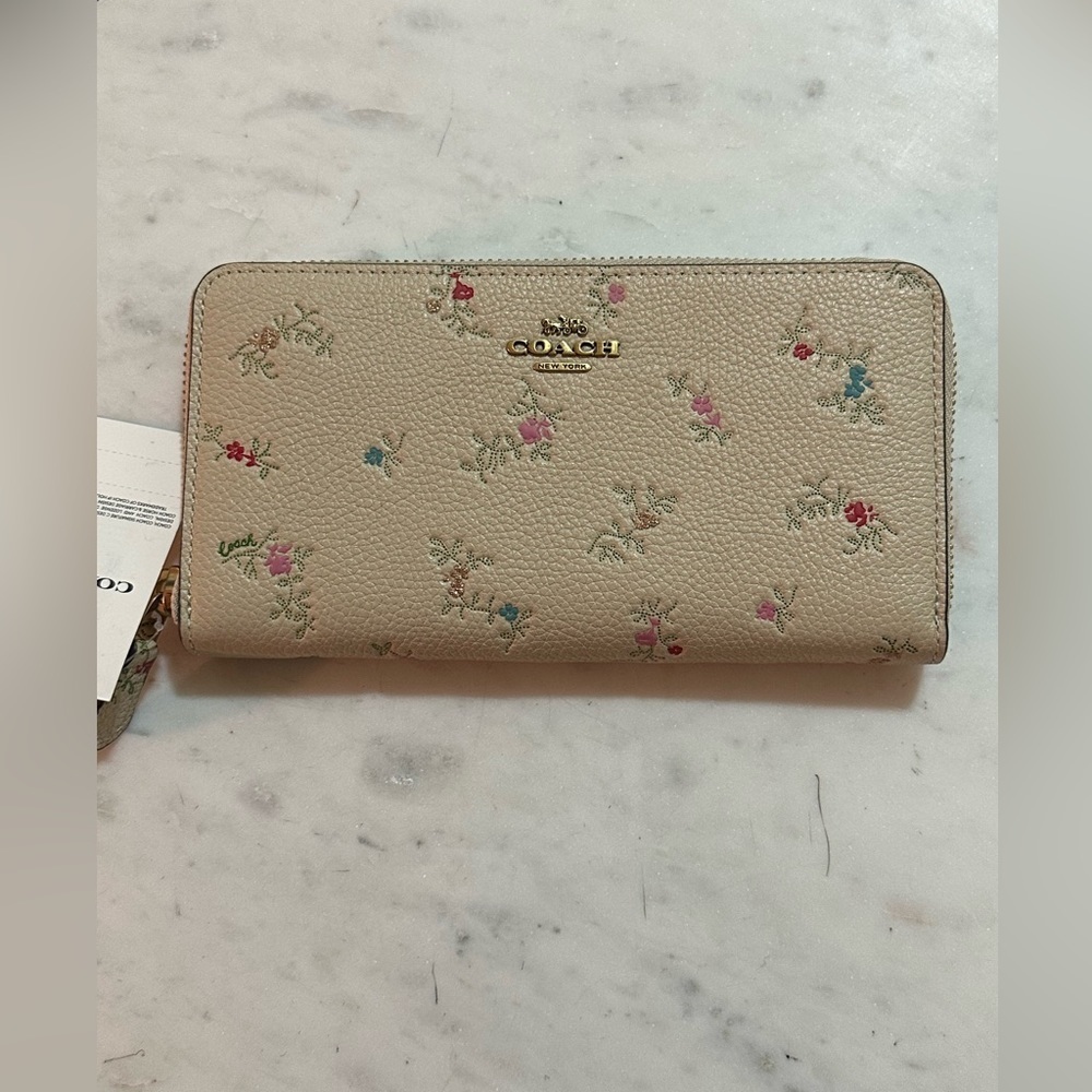 Coach zip wallet with floral print